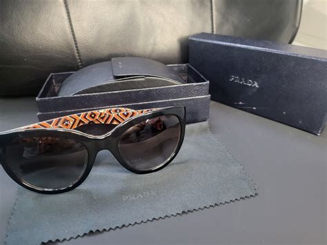 PRADA SPR05P SUNGLASSES at AtoZEyewear.com